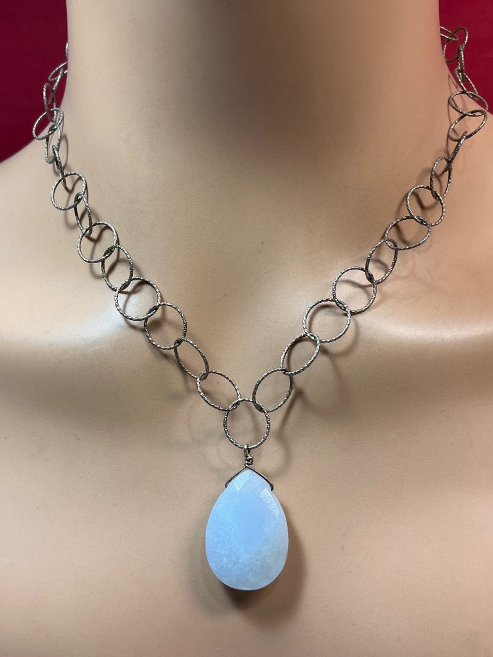Sterling Silver Circle ⭕️ Chain Necklace with a Blue Teardrop Shaped Stone. 18.5